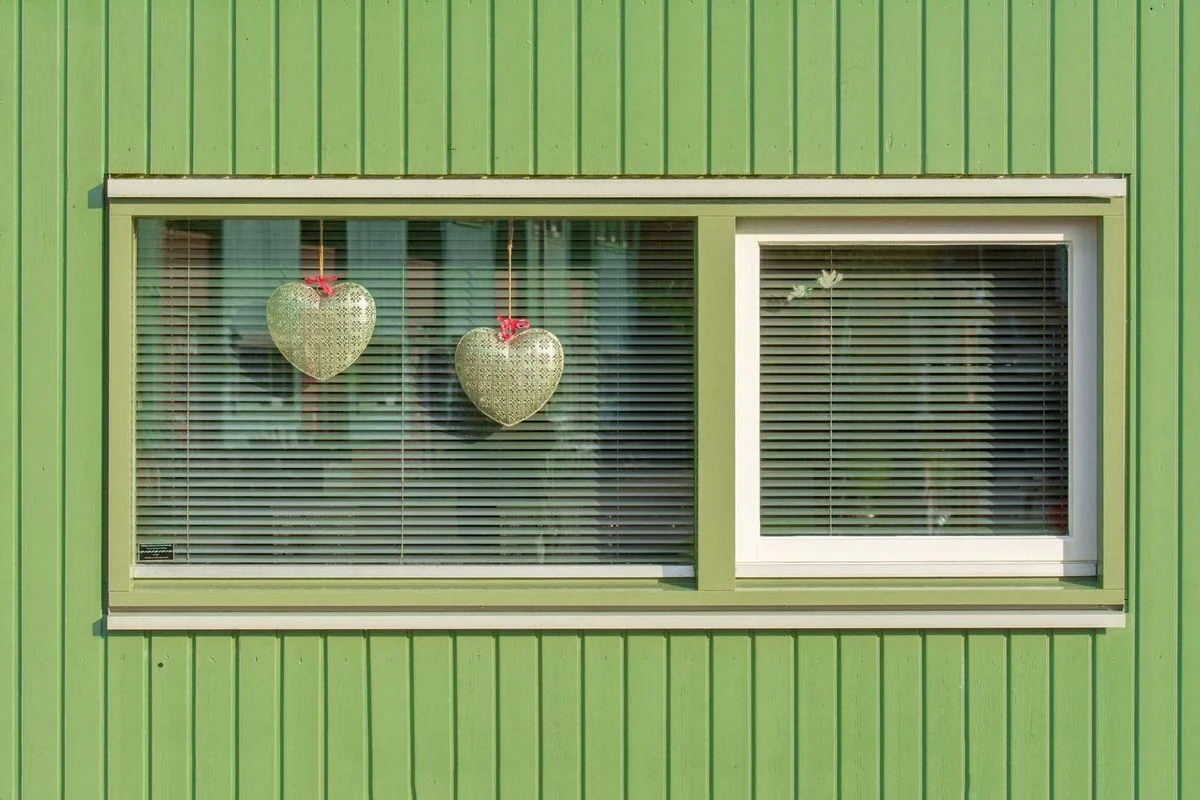 A wide window pairs a large fixed pane with a smaller sash that opens; only the part that opens counts as clear opening.