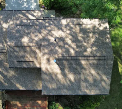 Sunlight dappling on new roof installed by HGE