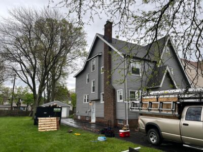 HGE siding installation project on a suburban home