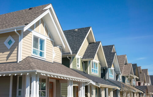 New Asphalt Shingle Roof On Neutral Colored Townhomes
