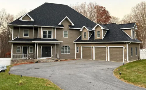 Residential home with terracotta vinyl siding
