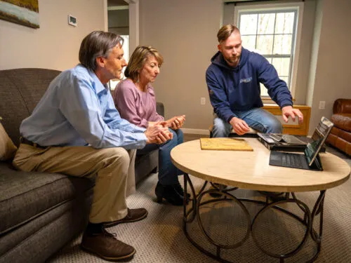 Home Remodeling Specialist Discusses Financing With Homeowners