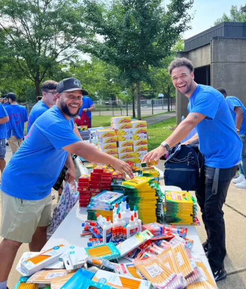 Local Home Genius Team Members Participate In School Drive Charity Event