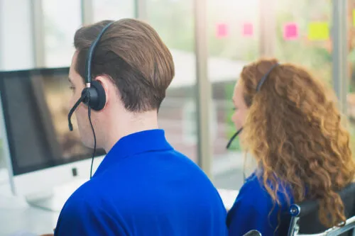 Home Genius Customer Service Representatives focused on setting an appointment with a happy customer.