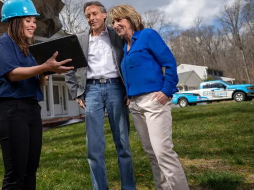 Home Improvement Project Manager Talking With Homeowners