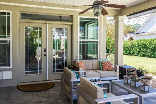 Custom french doors installed on older colonial home. Doors lead to the patio area and the back yard.
