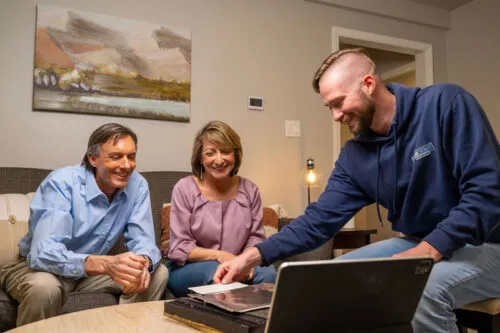 Home Remodeling Expert Performs Product Demo In Home