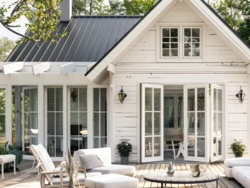 Patio with exteriors doors and custom windows on a residential home