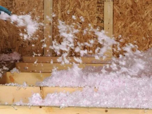 attic insulation blow by a contractor