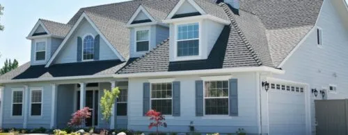 residential home with blue shutters