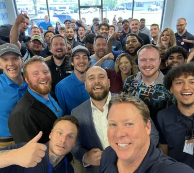 Group selfie of Home Genius Exteriors team members