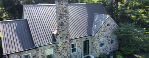 residential home with a metal roof