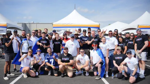 group photo of HGE team members at the Philly Plane Pull event
