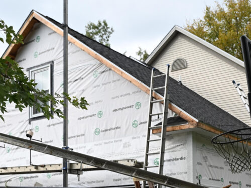 ground shot of a house with old gutters removed, ready for new system to be installed