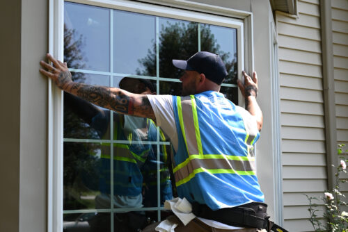 Home Genius technician fitting a window replacement