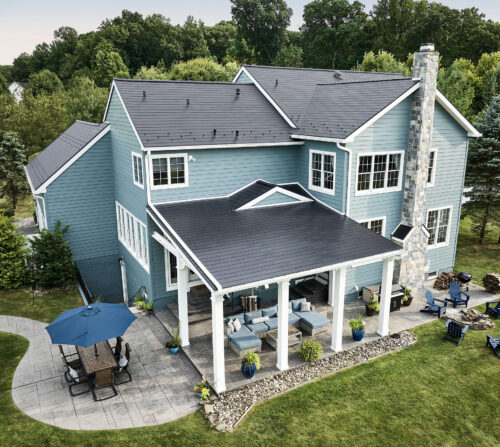 photo of home with a premium metal shingle roof