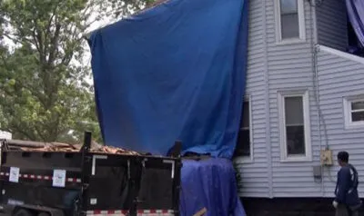 Navy Veteran’s Widow Gets New Roof in Delmar