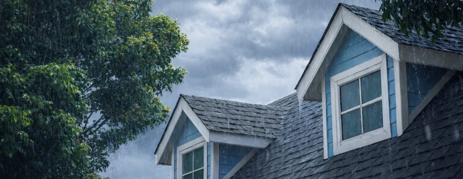 a home being rained on during a spring shower