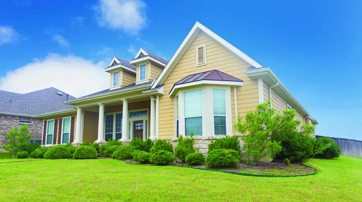 Beautiful newly constructed home with landscaped yard
